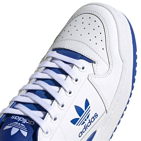 adidas sneakers wit met donkerblauw|Adidas sneakers wit.